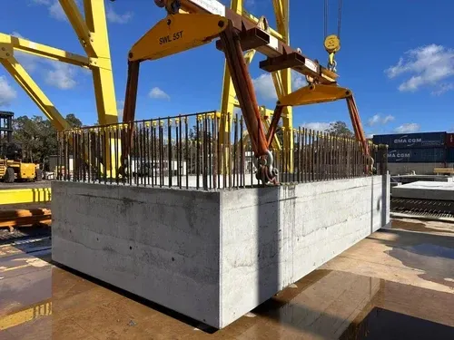 Precast element with starter bars lifted by a gantry crane
