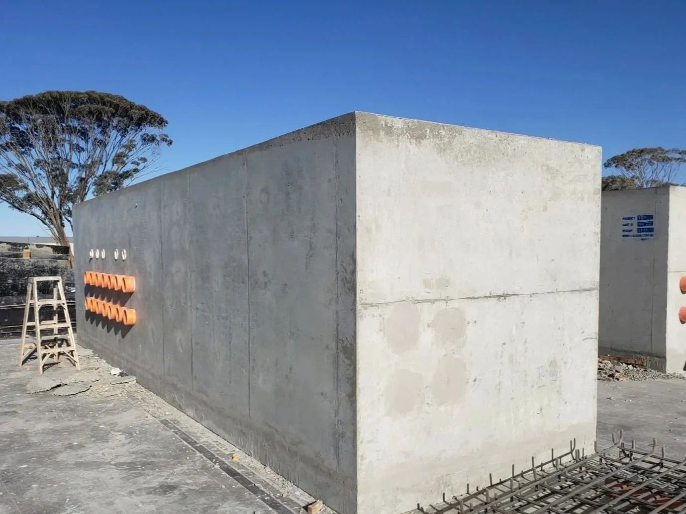 Precast concrete wall unit with cast-in penetrations
