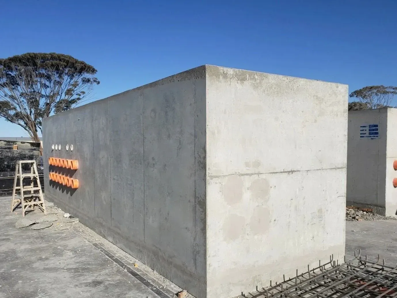 Precast concrete wall unit with cast-in penetrations